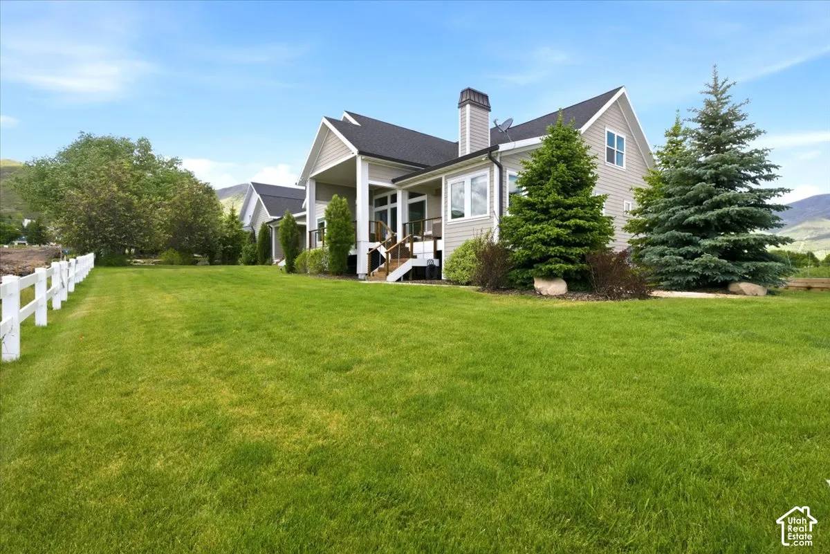 View of Backyard featuring tress