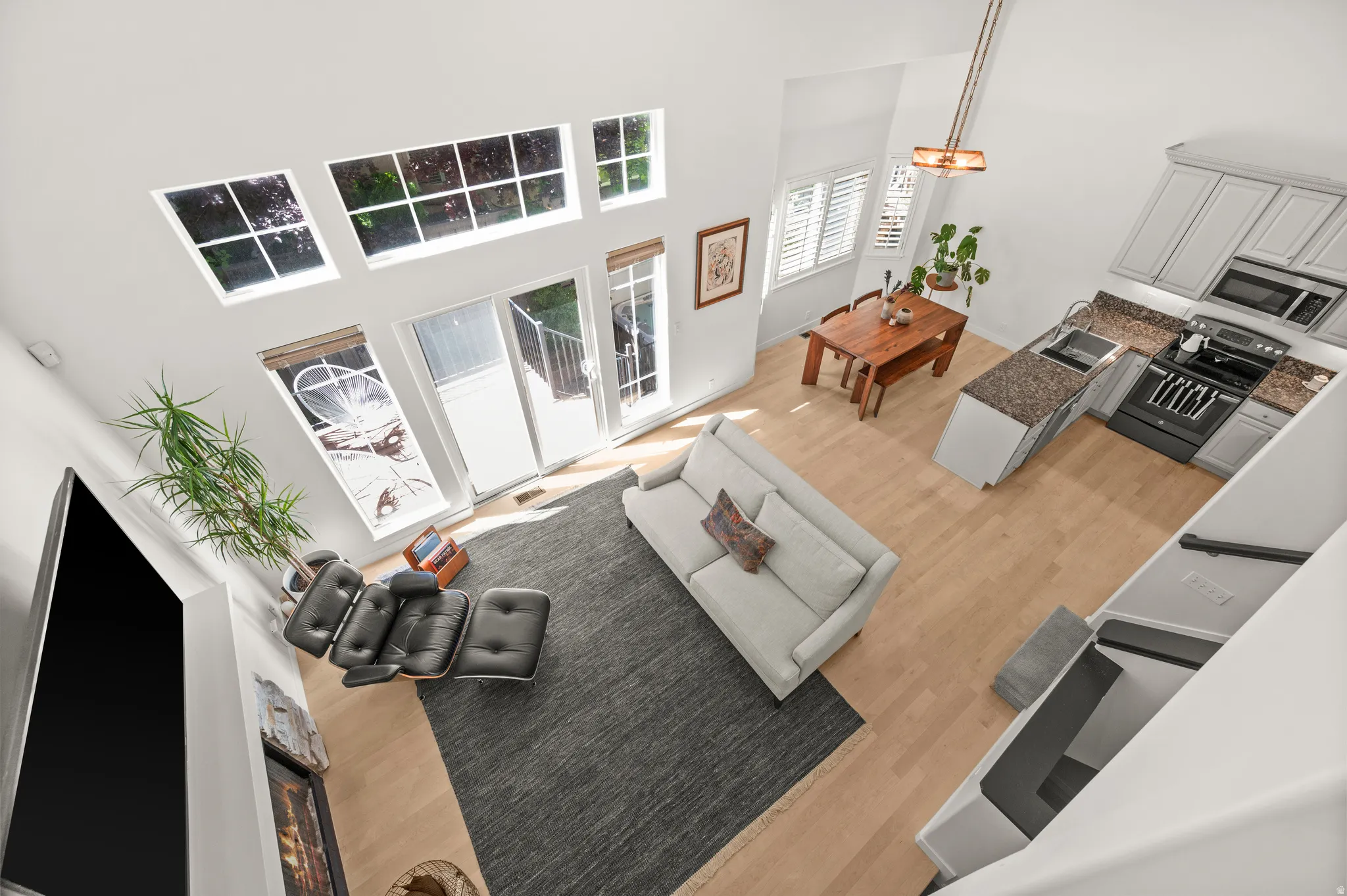 Great room with vaulted ceiling and southern light