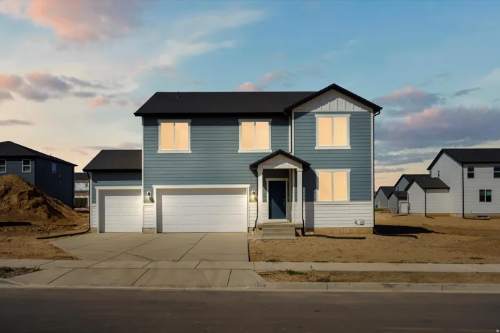 Two-story residence featuring blue and white horizontal siding