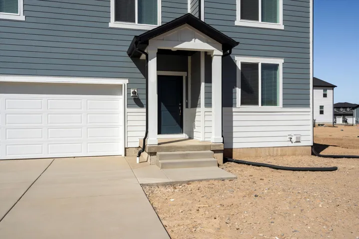 Contemporary exterior featuring multi-toned siding