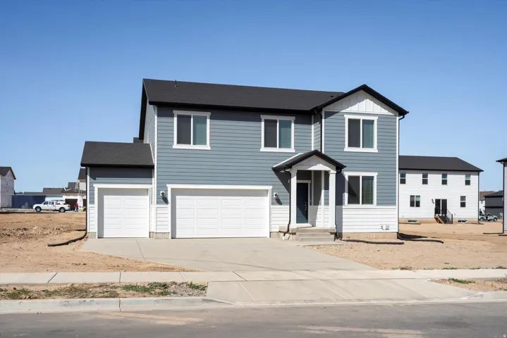 Contemporary two-story residence with a multi-tone siding exterior