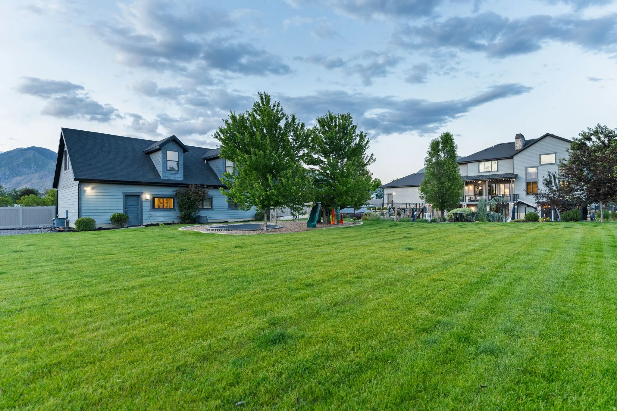 Expansive green lawn providing ample outdoor space
