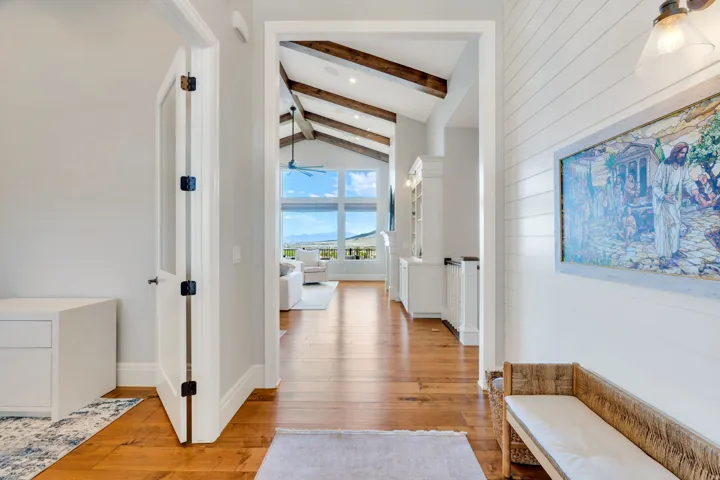 Hardwood flooring extending throughout the main living spaces