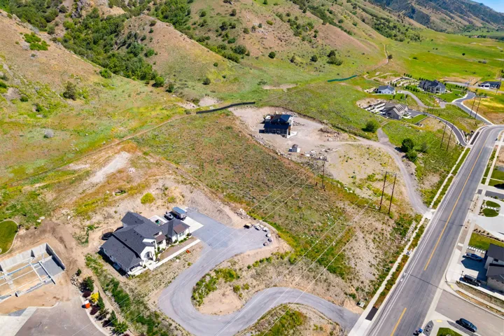 Aerial perspective showcasing multiple homesites surrounded by natural terrain