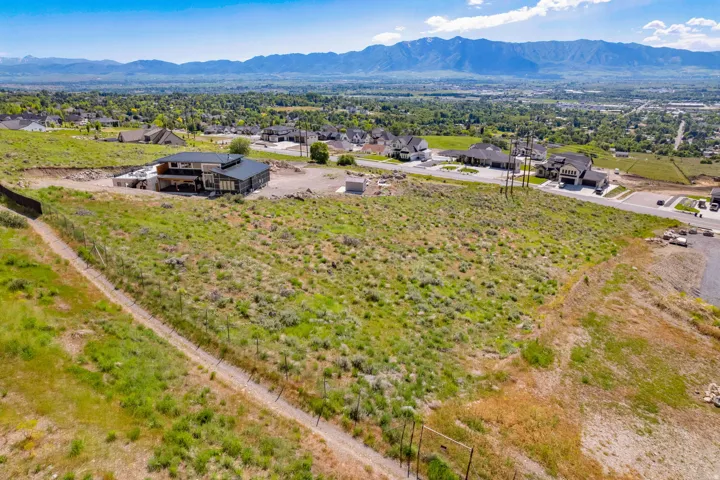 Expansive undeveloped parcel featuring varied topography and natural vegetation