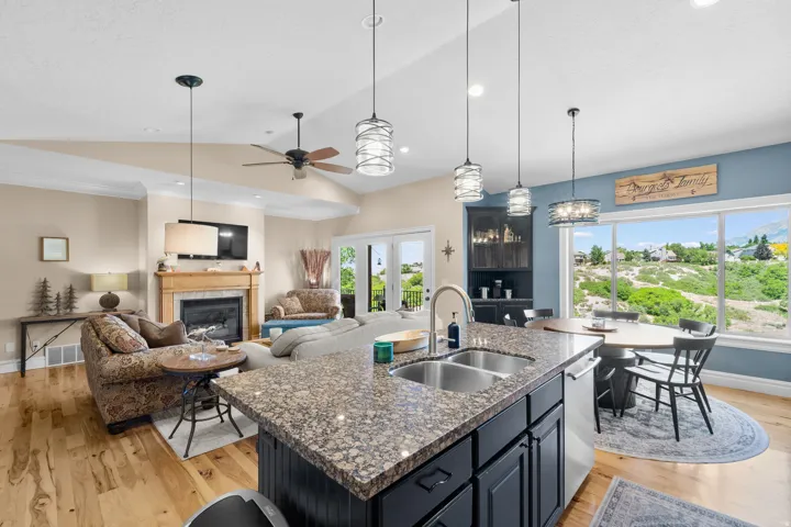 Kitchen island with granite-style countertop and double basin sink