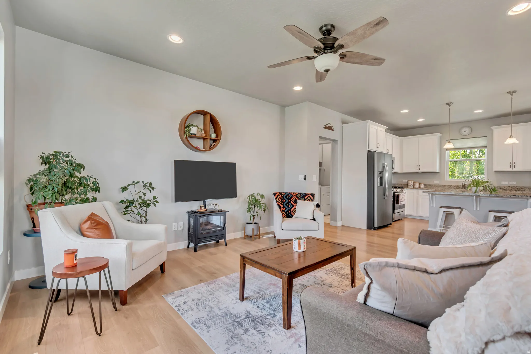 Step into this open-concept living space designed for effortless flow.