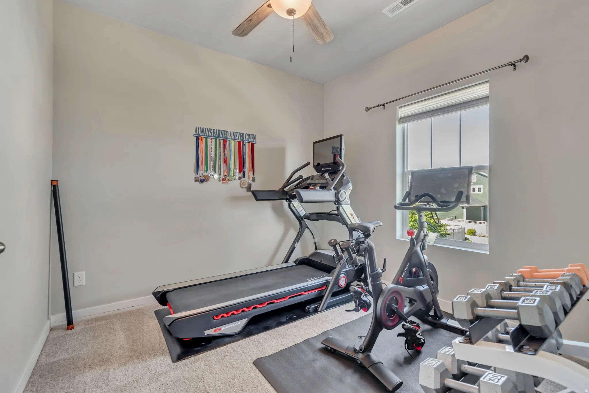 The third bedroom upstairs - currently being used as a home gym. What will you use this space for?