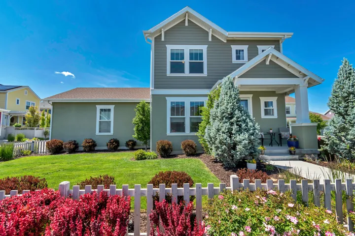 A charming Craftsman home highlighted by its covered front porch and an impressive first impression.