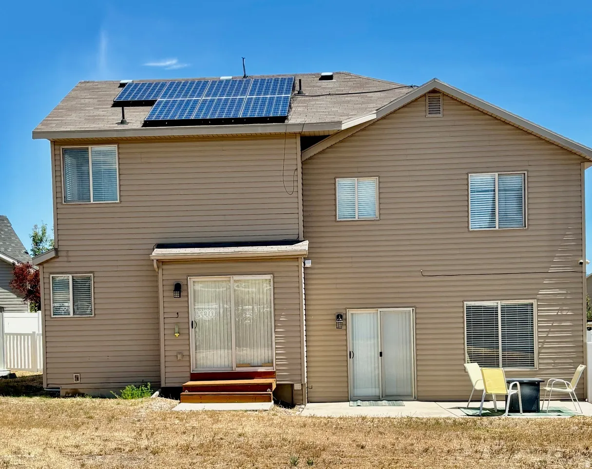 Back of home. Solar panels are owned!