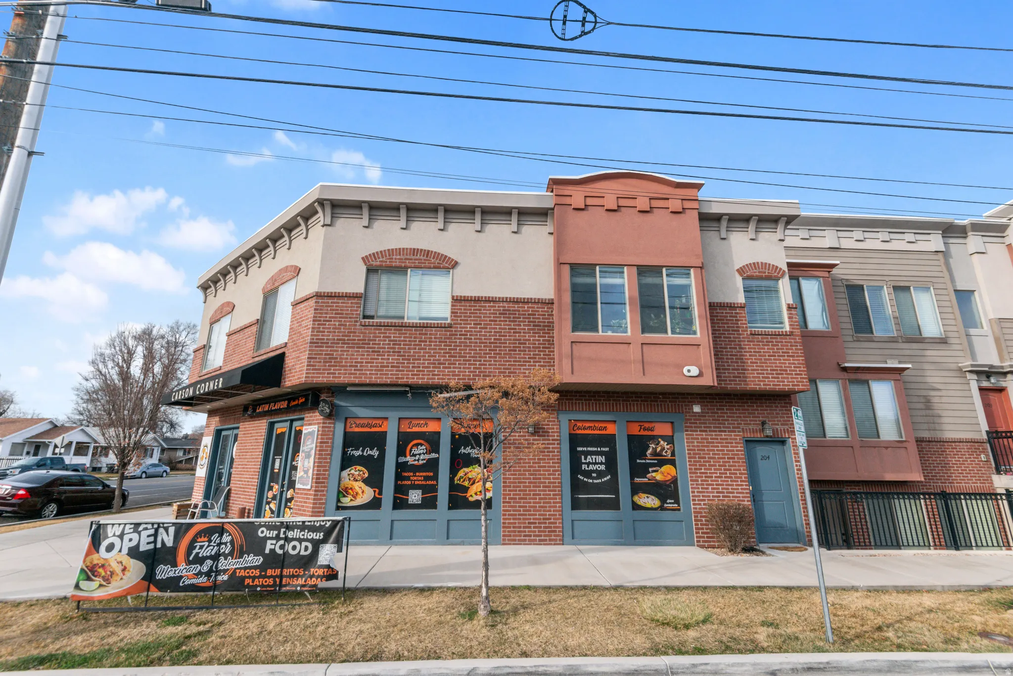 Mixed-use building featuring brick and stucco exterior