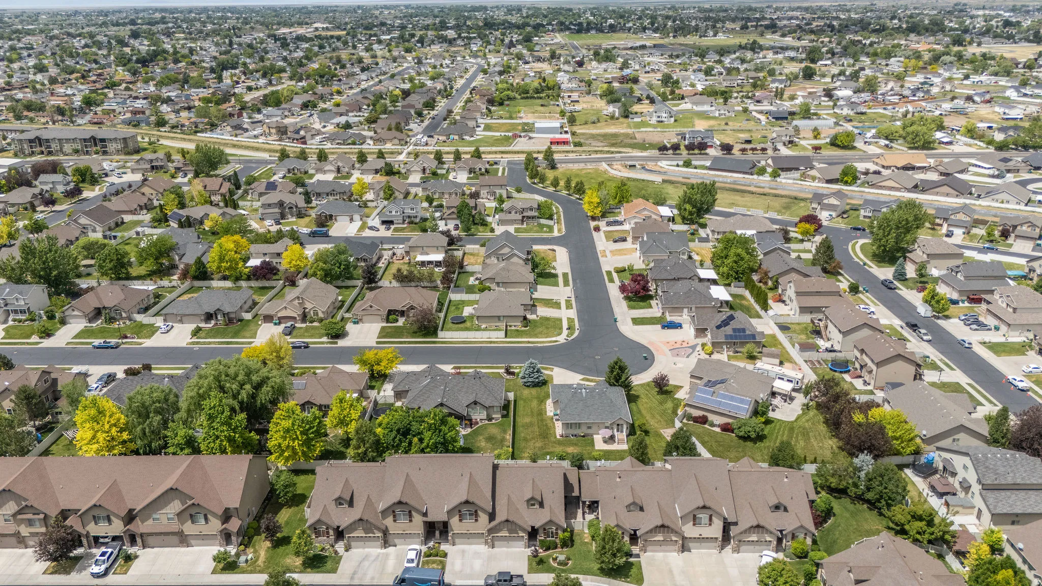 High-altitude aerial shows the neighborhood's prime Weber County location with easy access to surrounding amenities and a well-established street grid.
