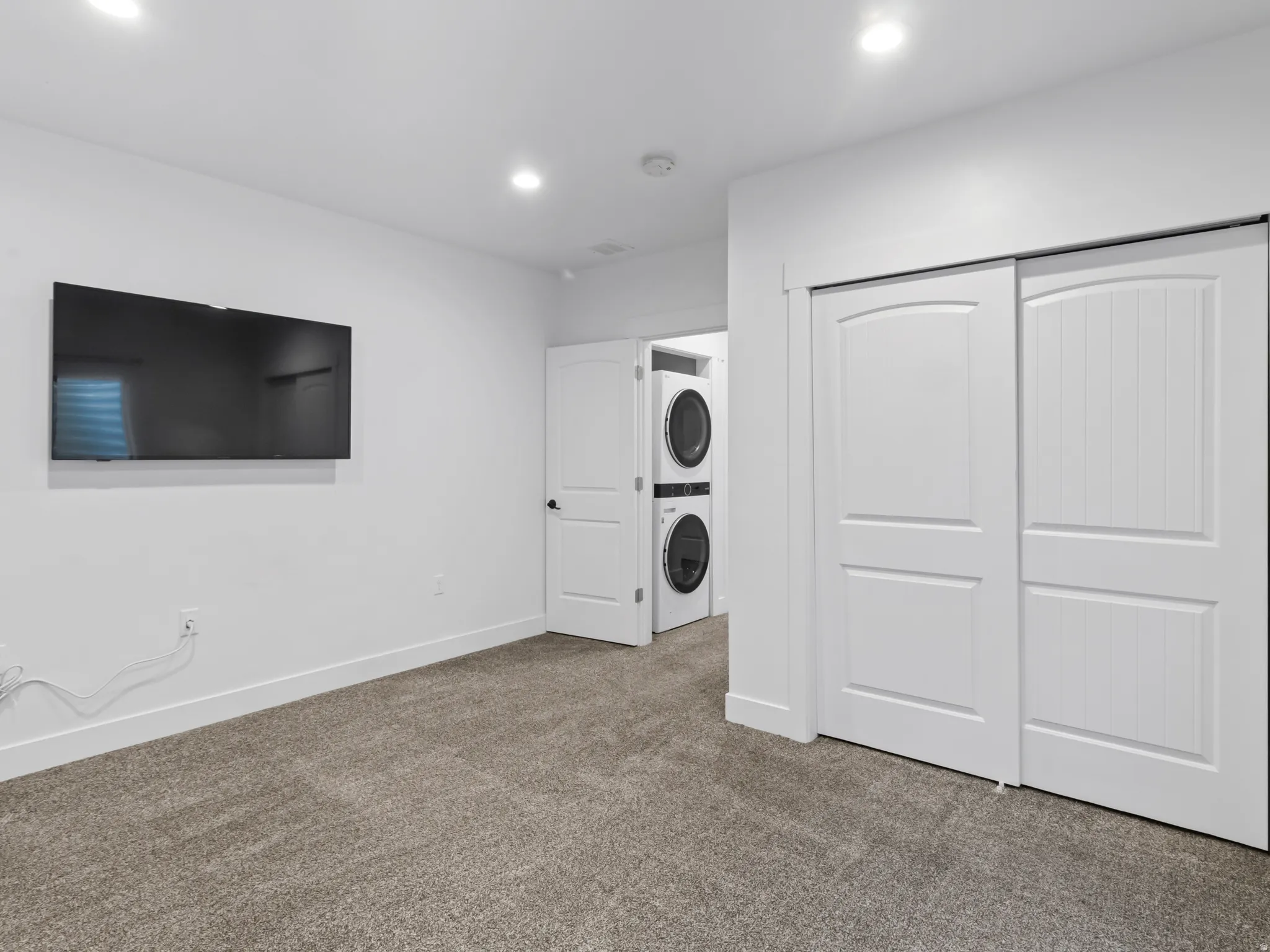 Basement bedroom #5. Second laundry in the hall. Matching set to all other appliance
