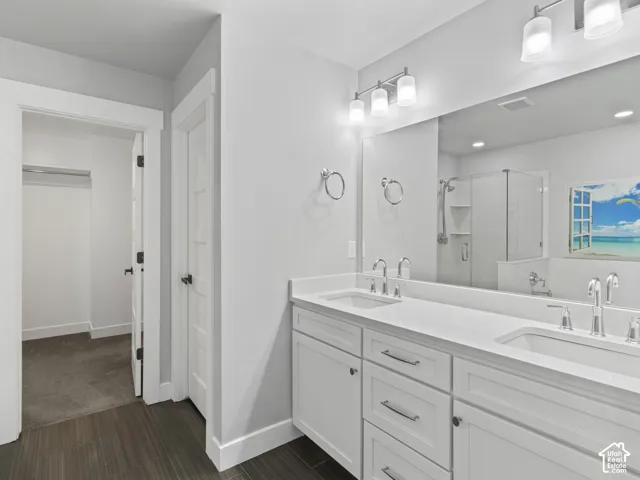Primary bathroom, double vanities, separate water closet, large walk in closet