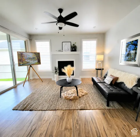 Living space with portrait TV on easel (virtually added), with current furniture