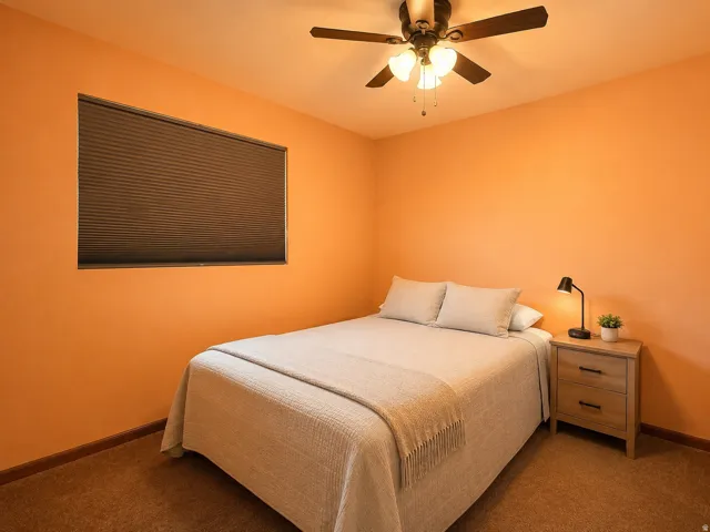 Room featuring a ceiling fan with integrated lighting, a window with horizontal blinds, and wall-to-wall carpeting