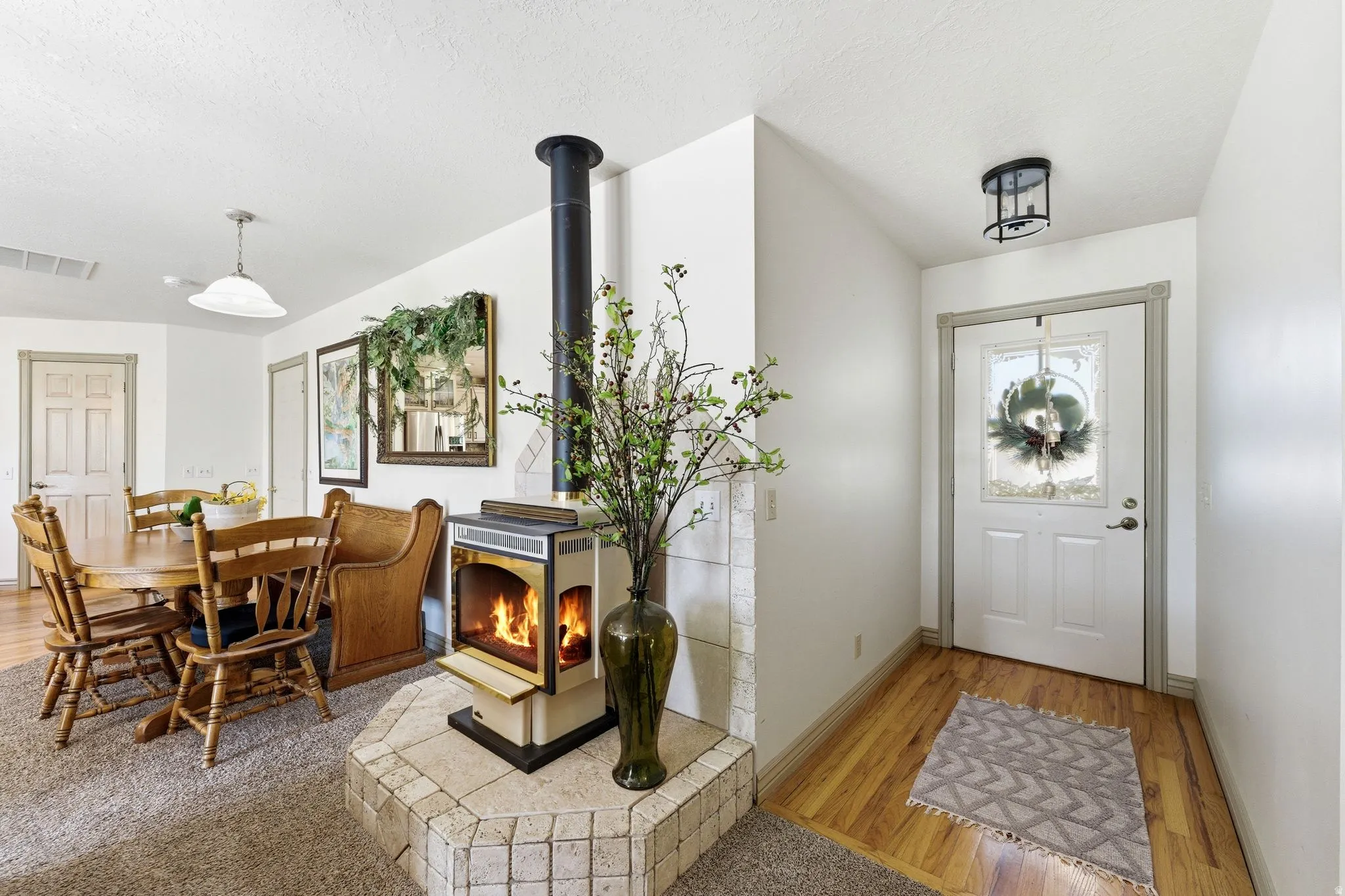 Wood-burning stove with tiled hearth