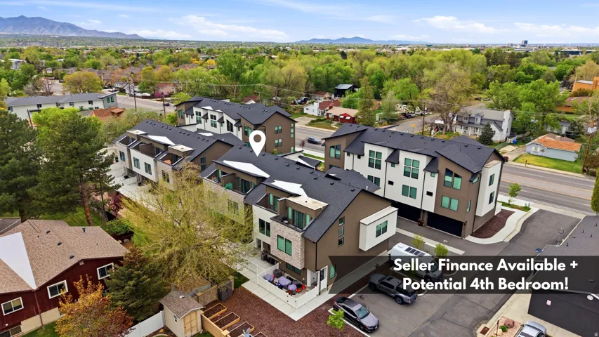 Modern townhome development featuring multi-level units with contemporary facades