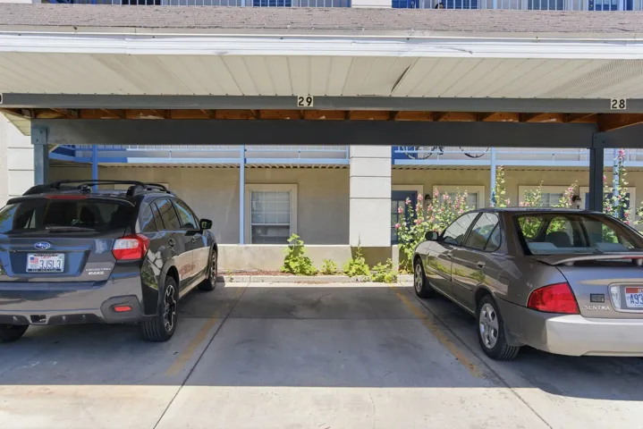 Covered parking spaces with designated numerical markers