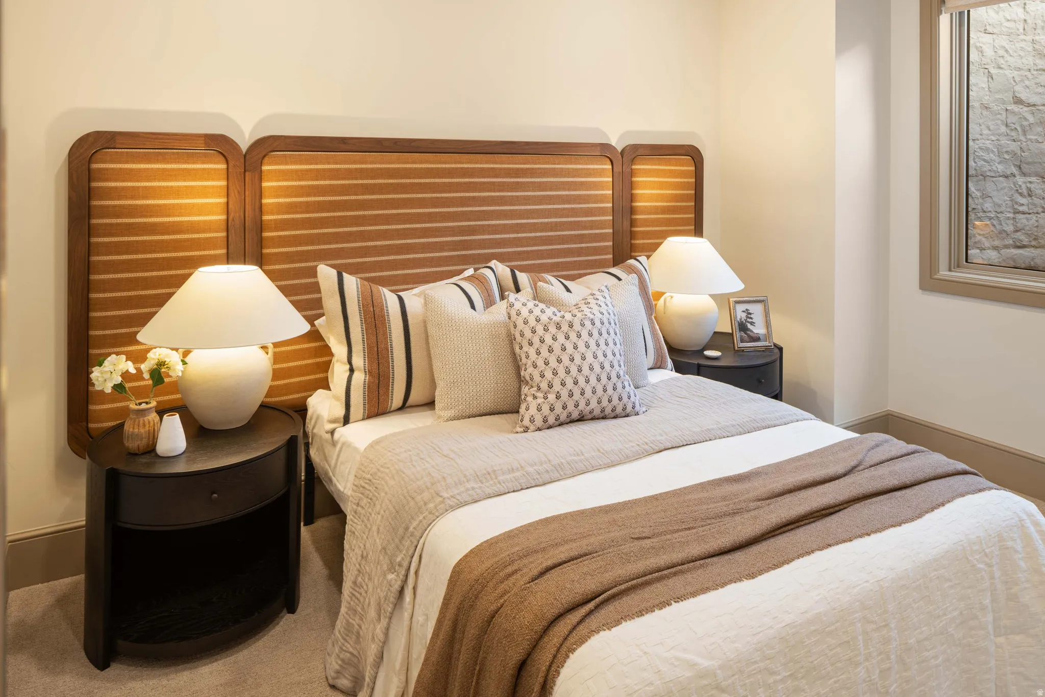 Integrated wood-frame headboard with horizontal slat detailing