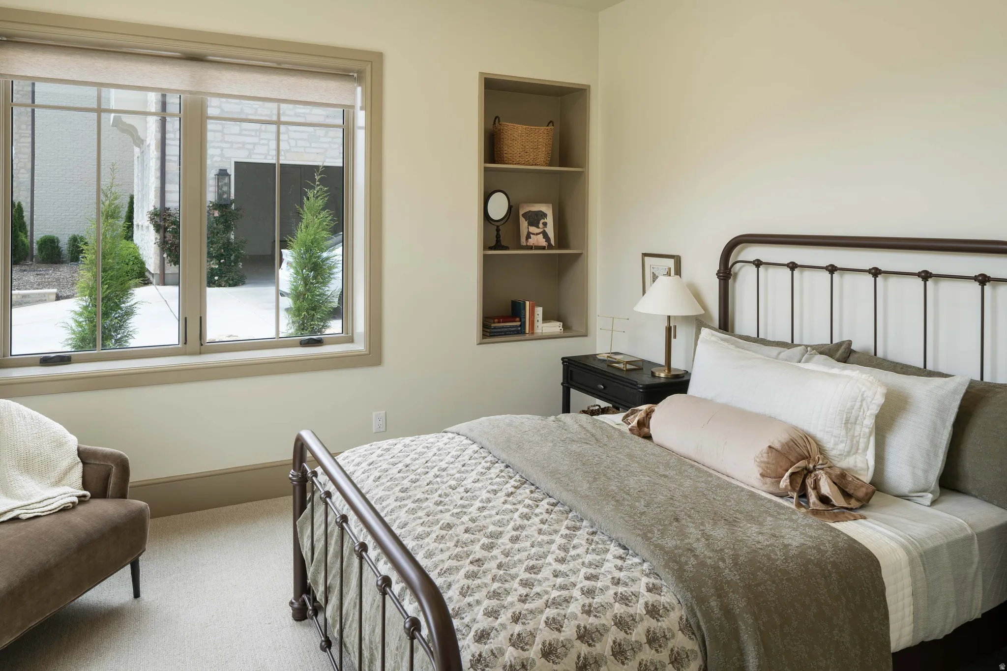 Bright interior space featuring a multi-pane window with a light-filtering shade