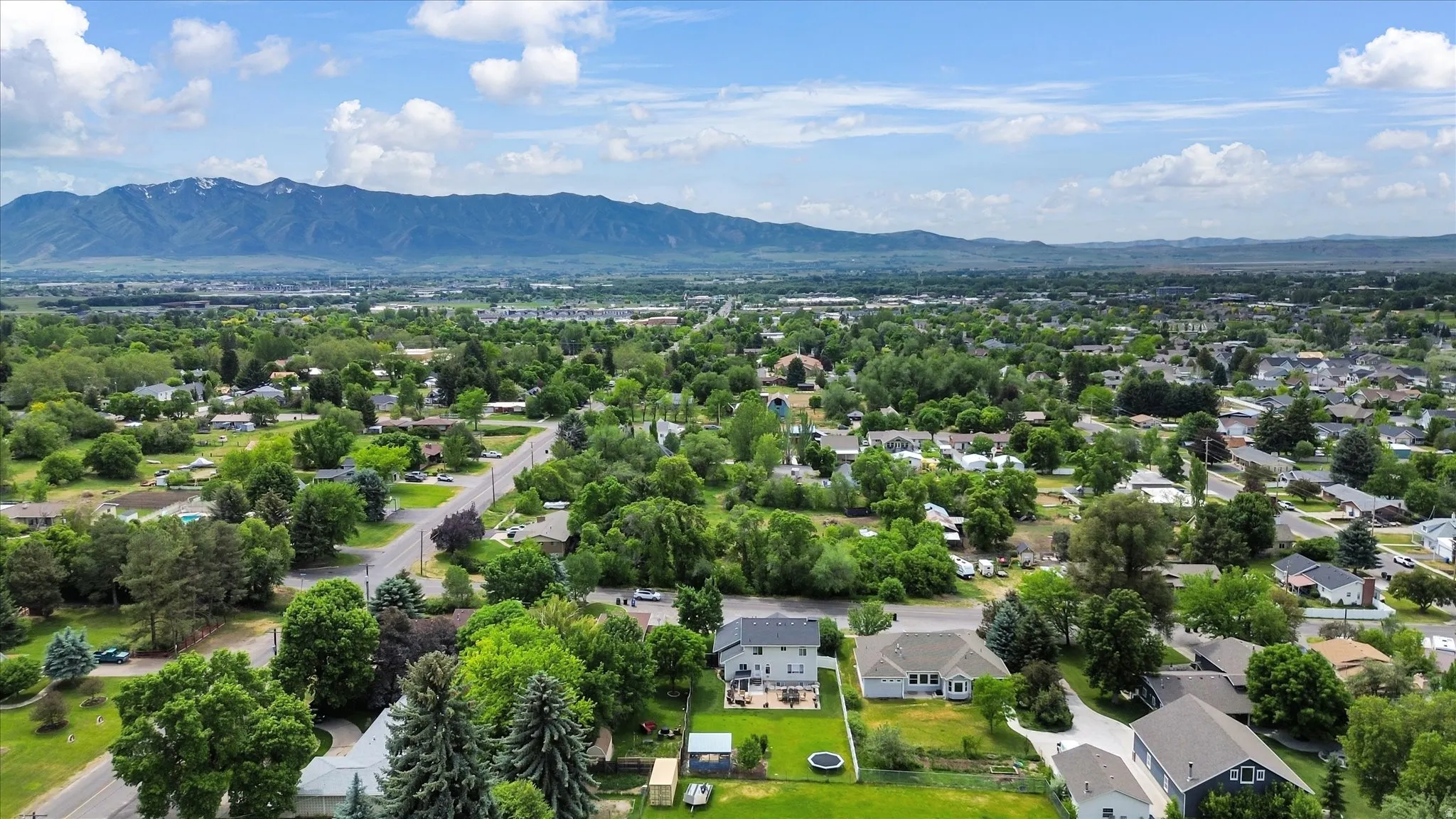 Expansive neighborhood featuring mature trees and established residential properties