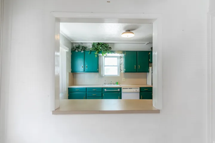 Kitchen pass-through window with a laminate counter