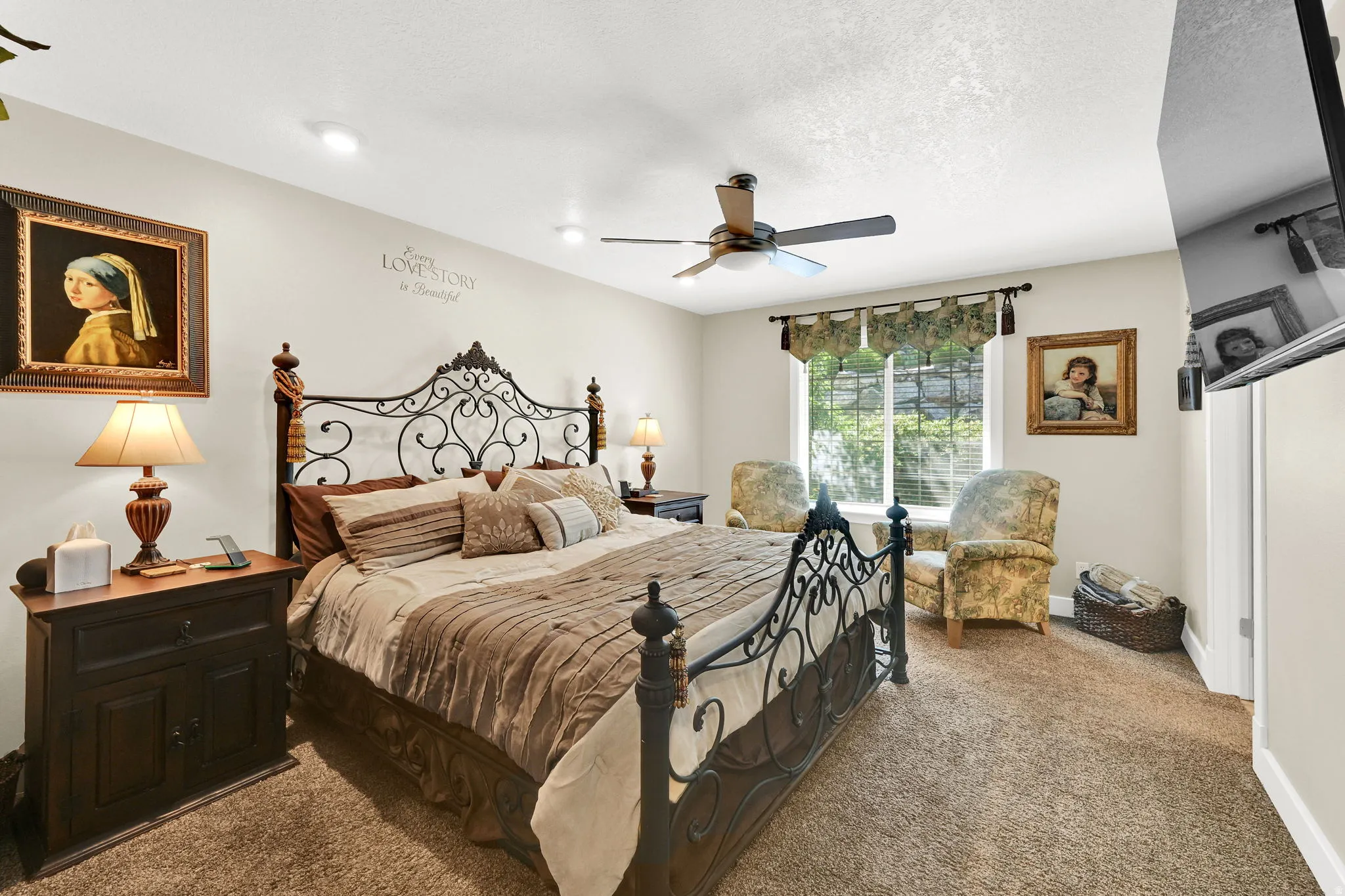 Carpeted bedroom featuring a window with a valance, a ceiling fan, recessed lighting, and a closet with a white door