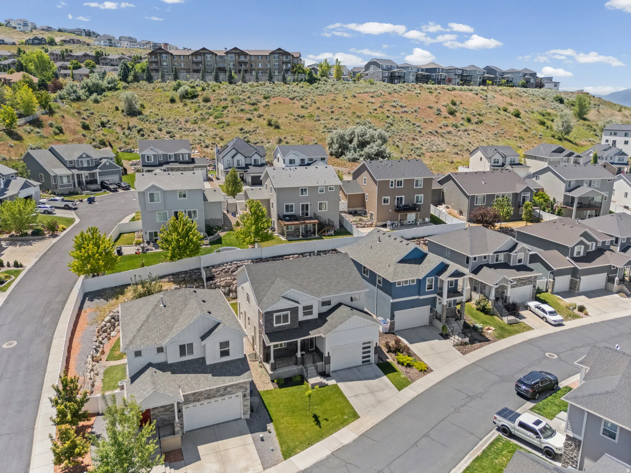 Residential neighborhood with varied architectural styles and established landscaping