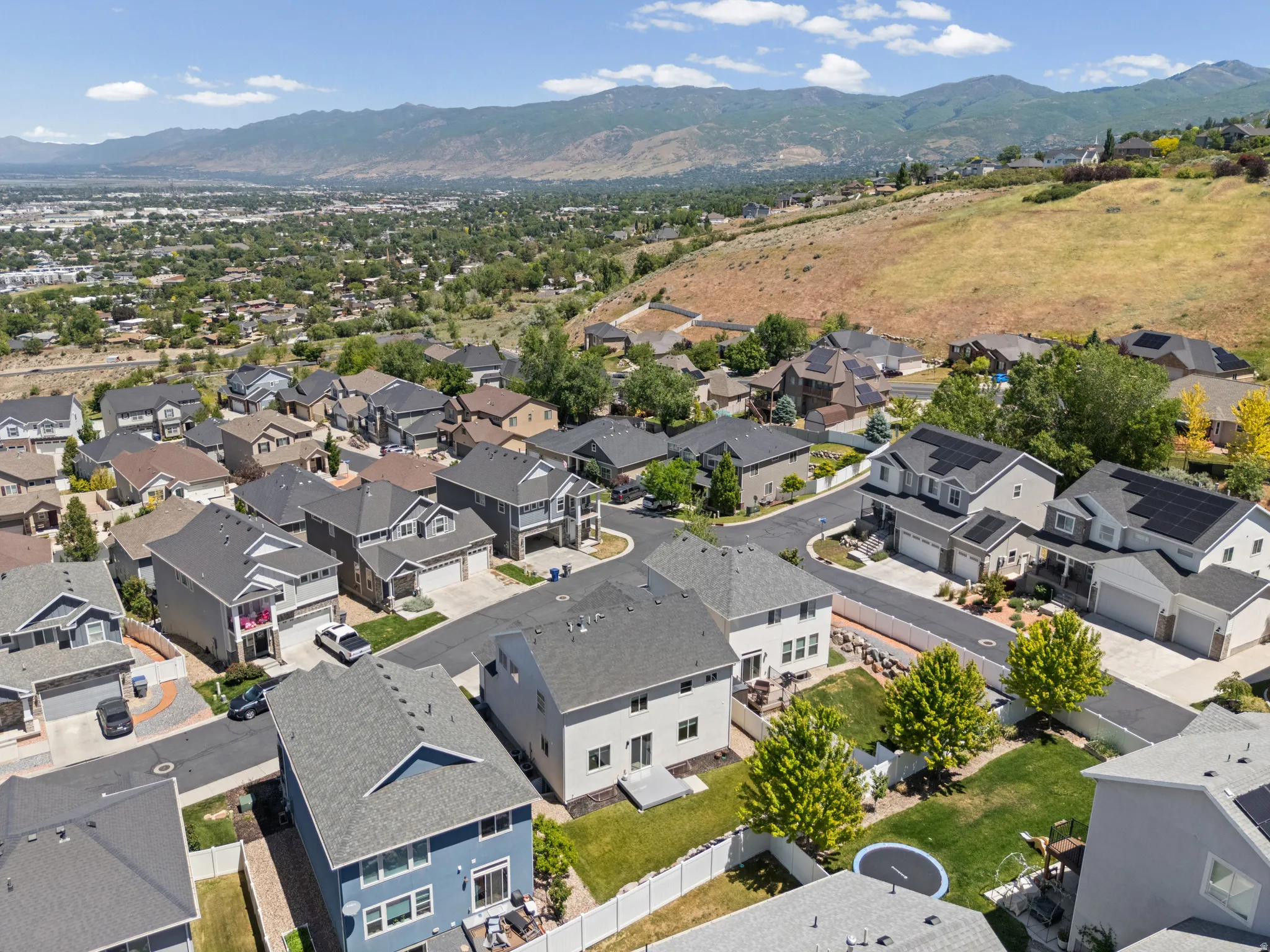 Residential neighborhood with a mountainous backdrop