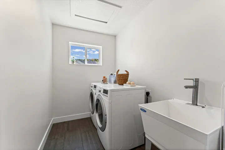 Utility sink with a chrome faucet