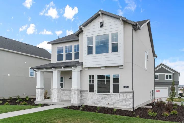 Modern two-story residence with a covered porch