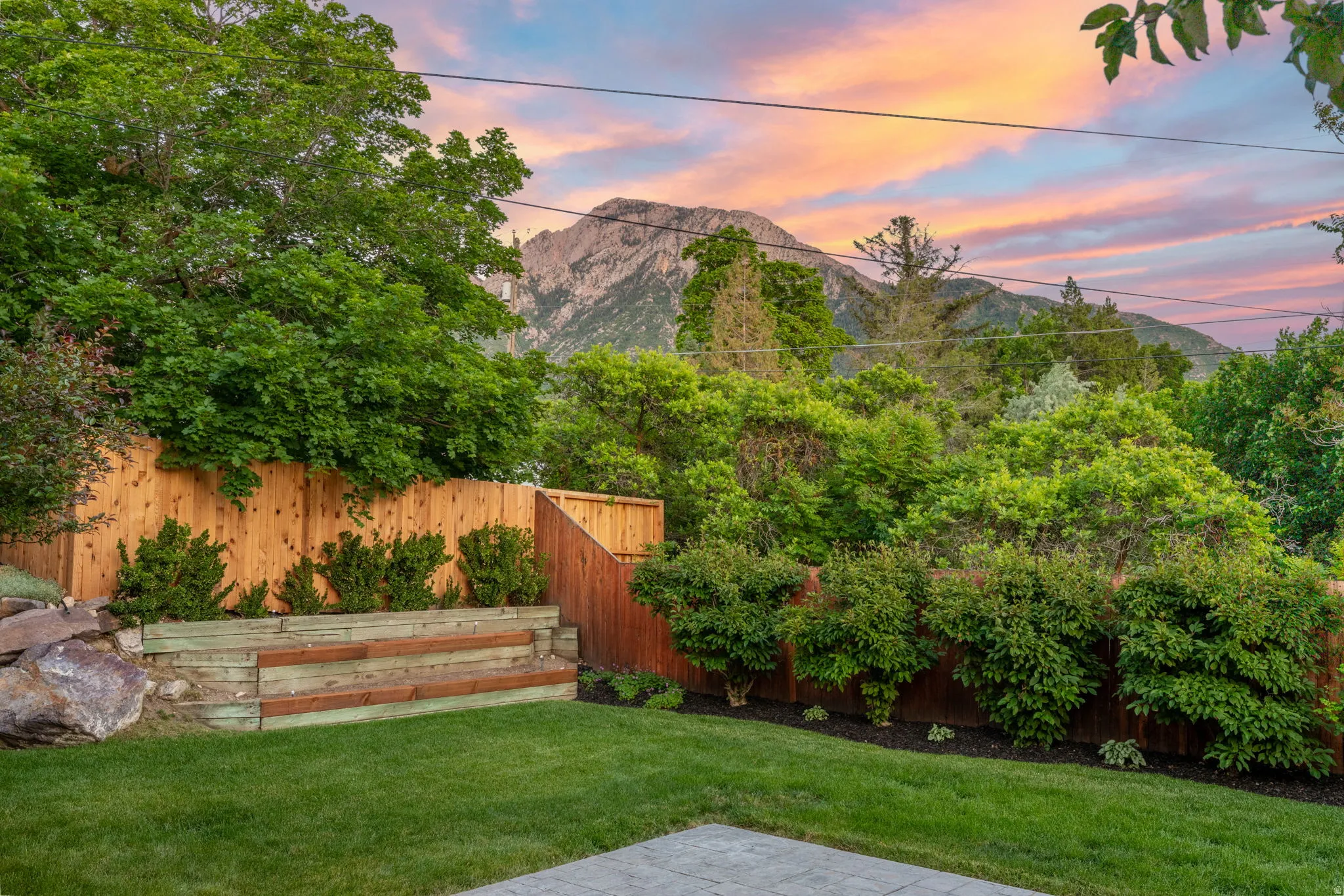 Private yard, large poured patio, with views of Mt. Olympus.