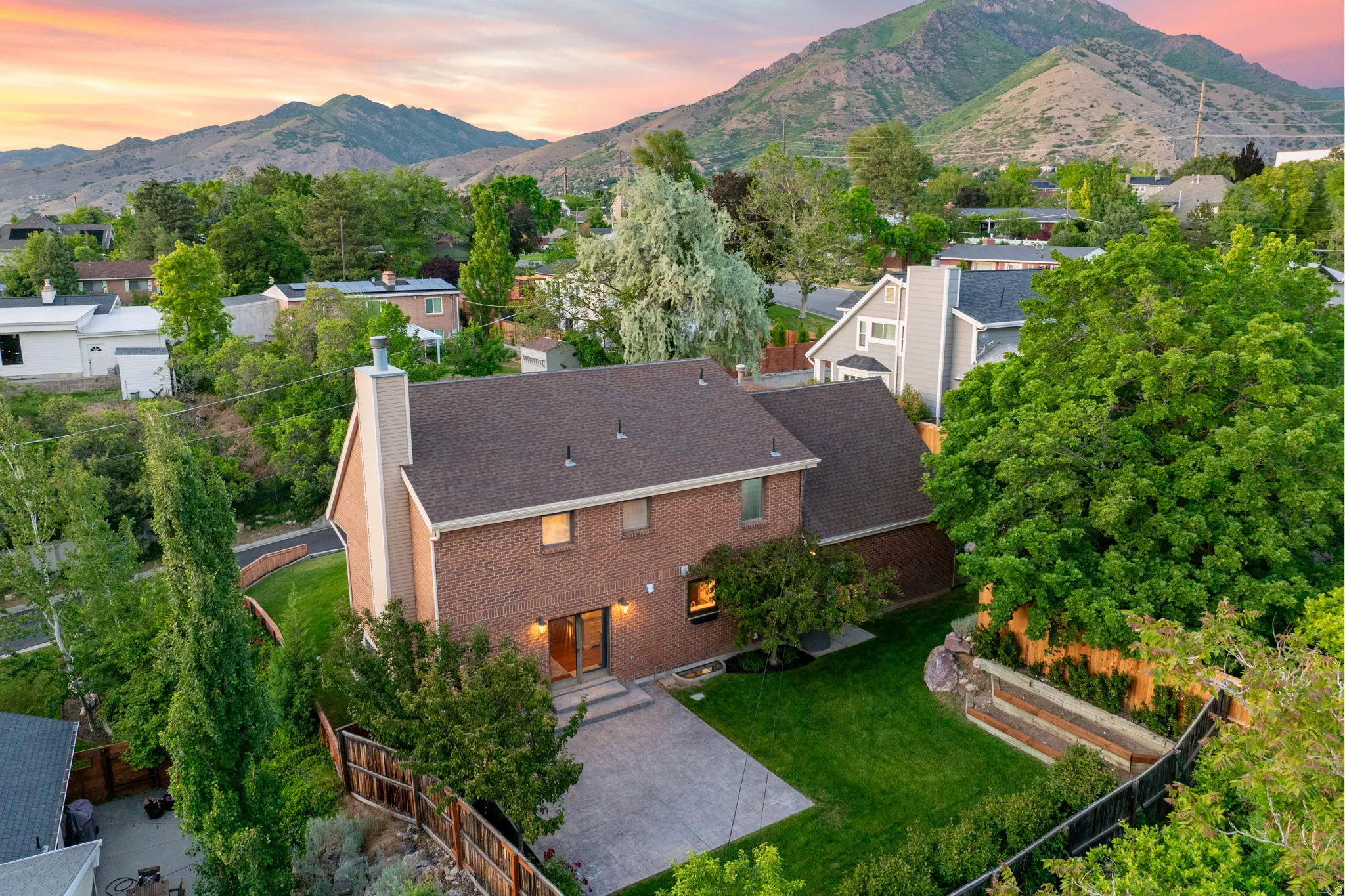 All-Brick exterior, private yard, large poured patio, beautiful and mature landscaping.