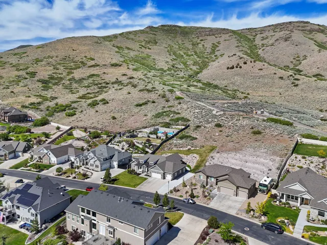 Residential neighborhood situated at the base of a verdant hillside