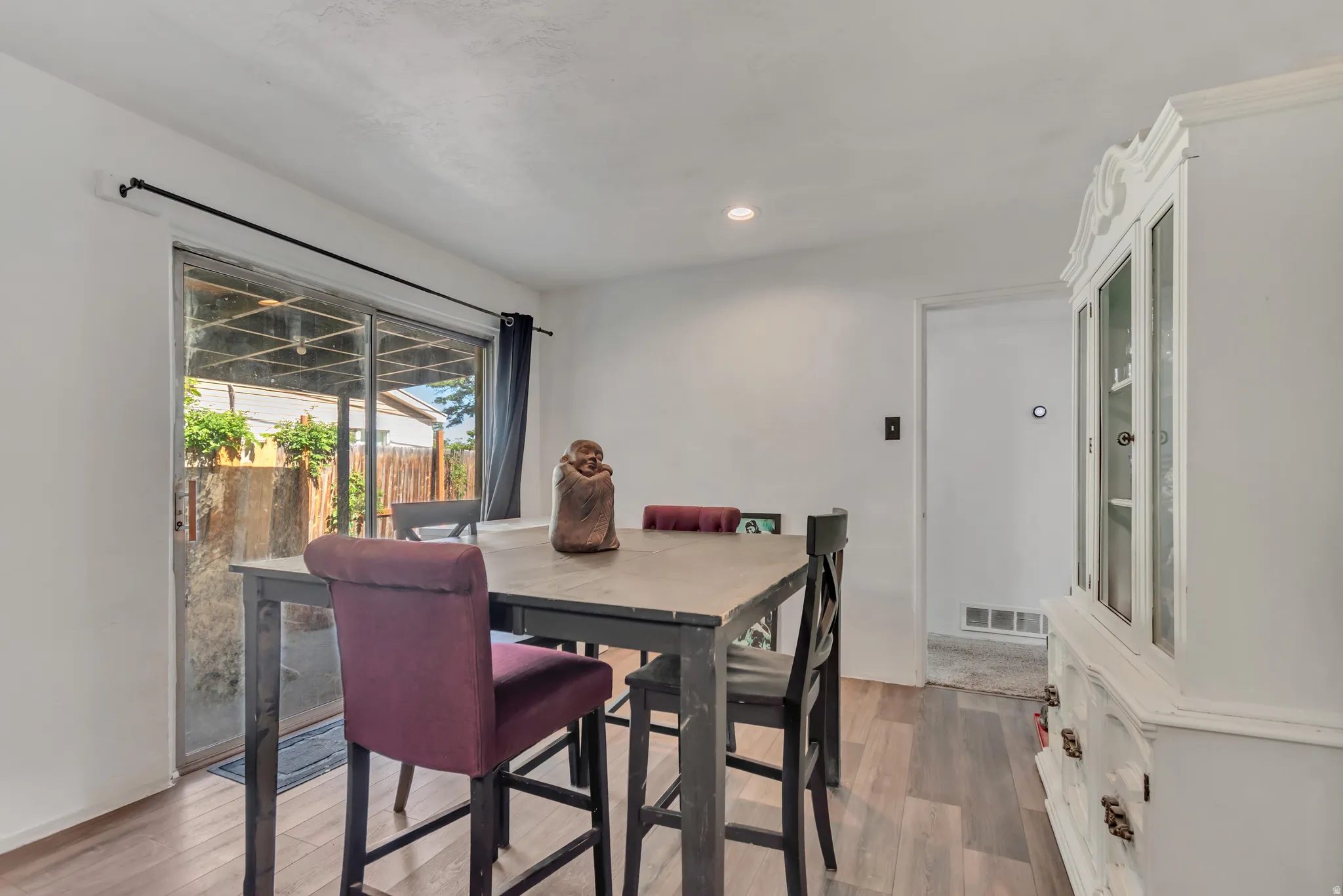 Sliding glass door opening to outdoor space