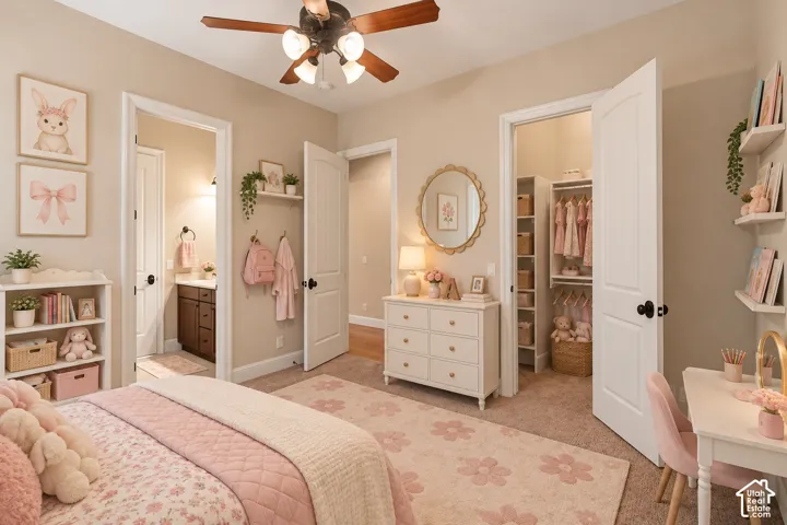 Neutral-toned room featuring a four-blade ceiling fan, multi-panel interior doors, wall-mounted display shelving, and a walk-in closet with built-in storage