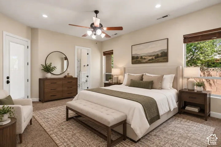 Neutral-toned bedroom featuring recessed lighting, a multi-light ceiling fan, wall-to-wall carpeting, and a glass-paneled exterior door