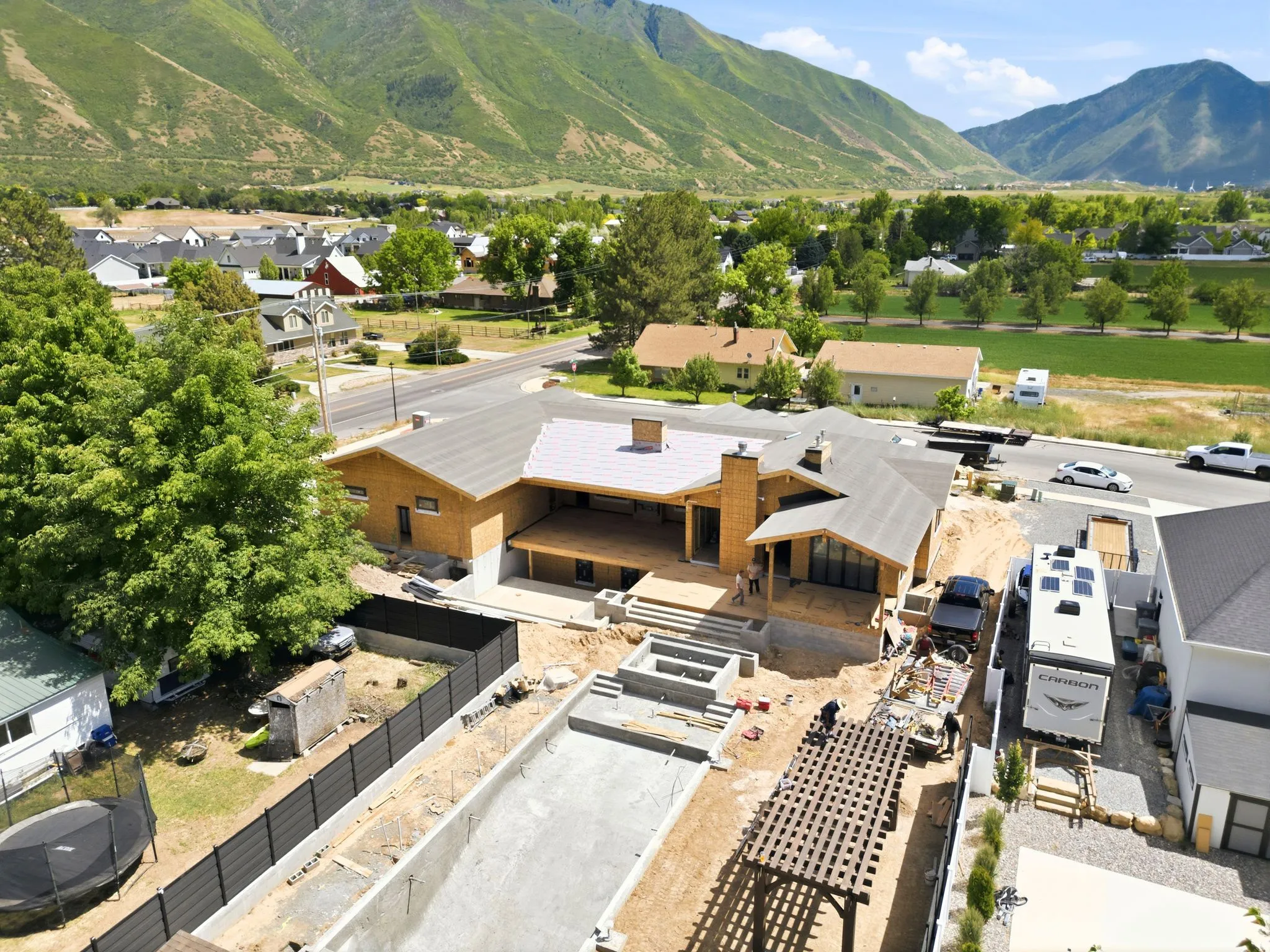 Rear of property featuring Spa / Pool with Pergola and covered Deck area