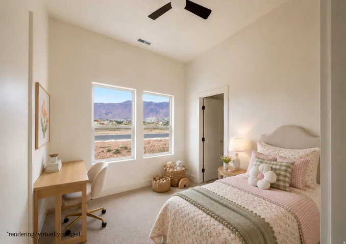 Room with sloped ceilings, two large windows, a built-in ceiling fan, and light-toned carpeting