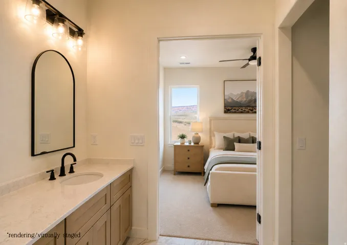 Bathroom vanity with light wood-finish cabinetry, light-toned countertop, and matte black fixtures