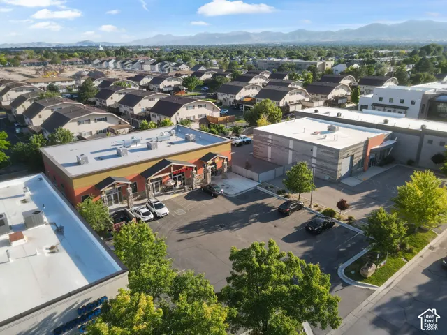 Commercial building featuring a flat roof and a structured facade with multiple entrances