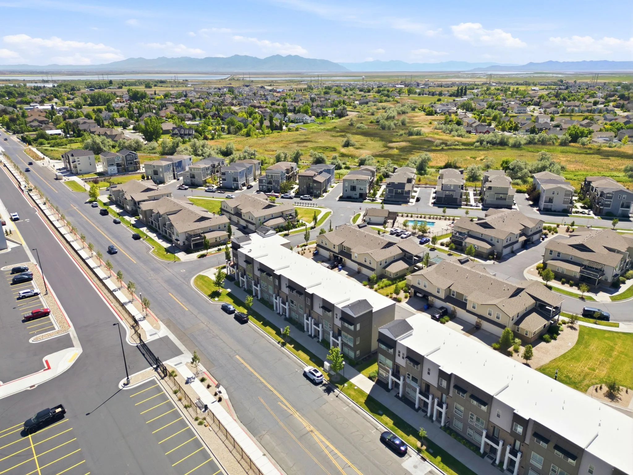Expansive aerial perspective showcasing a vibrant community with distinct architectural styles
