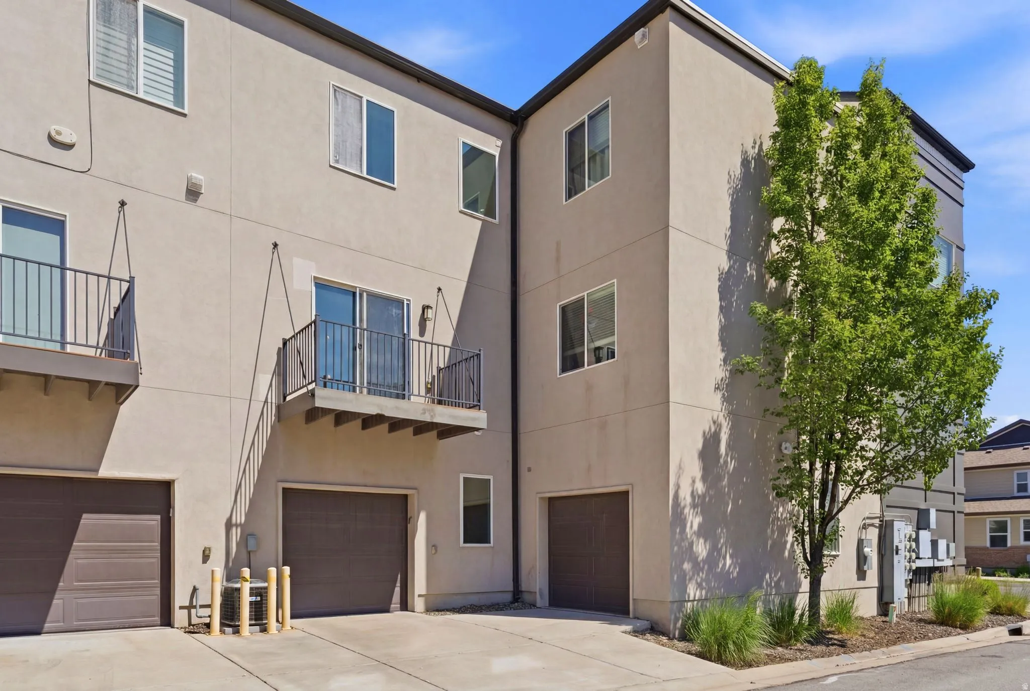 Contemporary multi-story exterior with stucco finish
