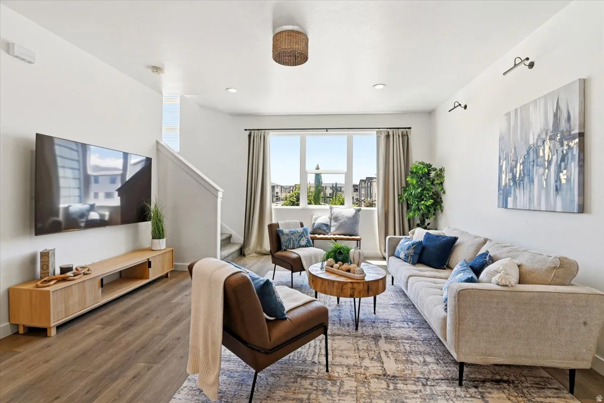 Extra-large window makes the living area light, bright, and cheerful. It has a view of the beautiful park across the street.