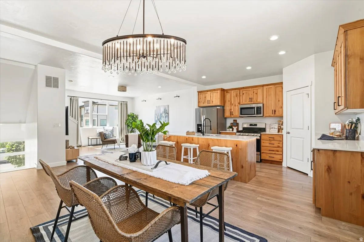 Beautiful hanging light over the dining table.