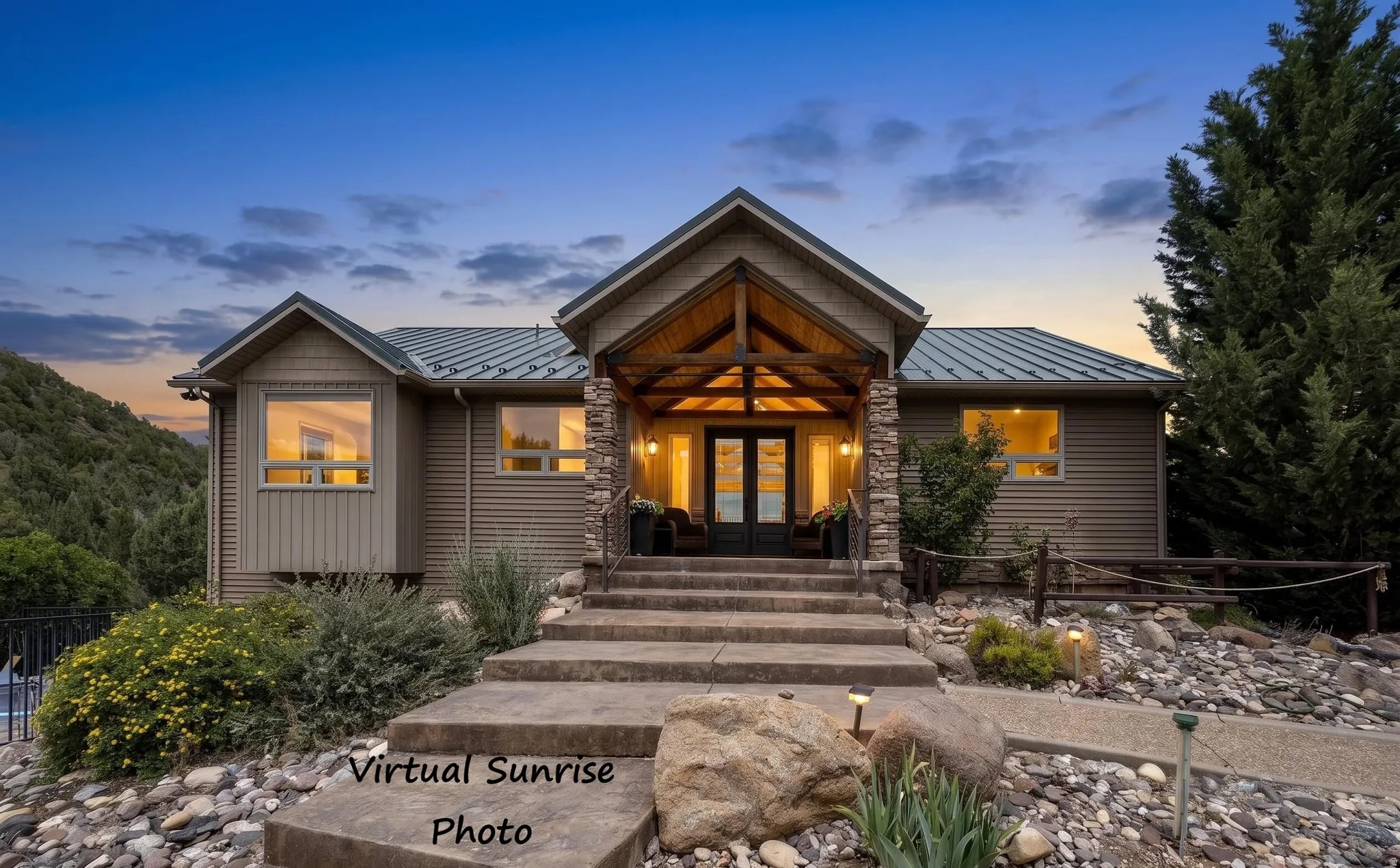 Craftsman-style exterior featuring a covered entry, stone accents, horizontal siding, and a metal roof