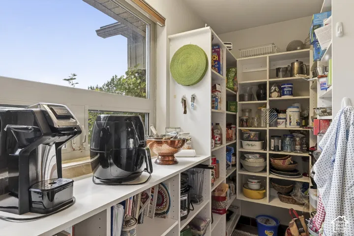 Built-in shelving providing extensive storage