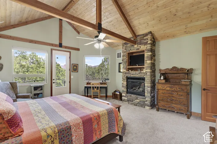 Vaulted wood-paneled ceiling with exposed wood beams