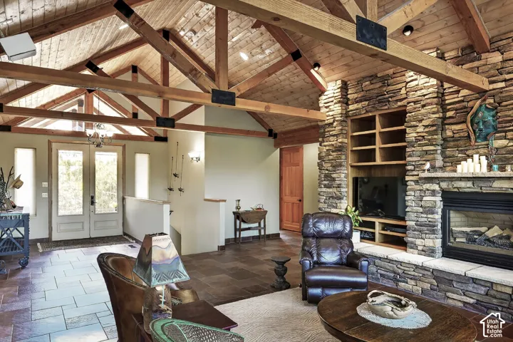 Vaulted wood-paneled ceilings with exposed timber beams define this interior space